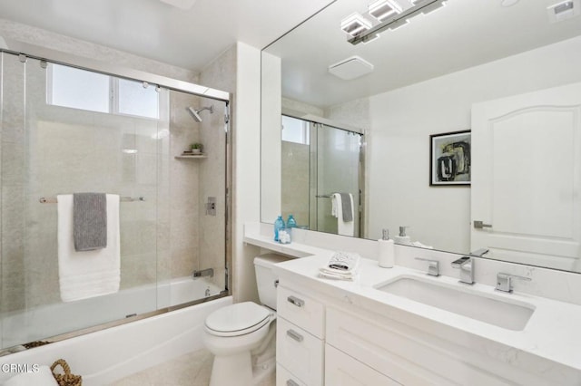 bathroom with toilet, vanity, enclosed tub / shower combo, tile patterned flooring, and visible vents