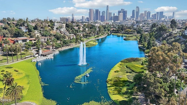 drone / aerial view with a water view and a view of city