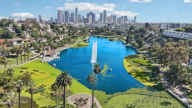 drone / aerial view with a water view and a city view