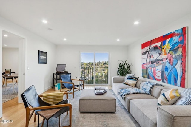 living room with recessed lighting and light wood-type flooring