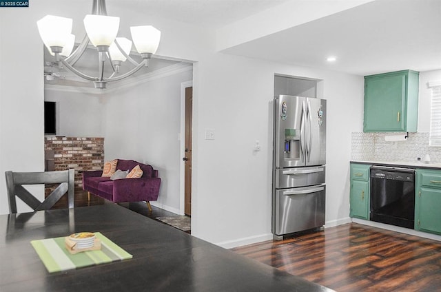 kitchen with stainless steel fridge, dishwasher, green cabinets, and backsplash