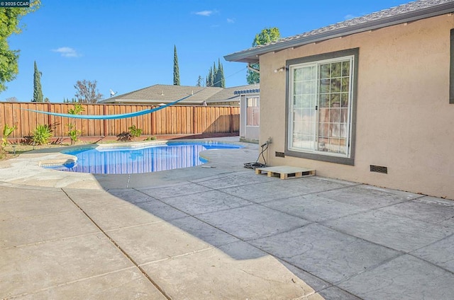 view of pool with a patio area