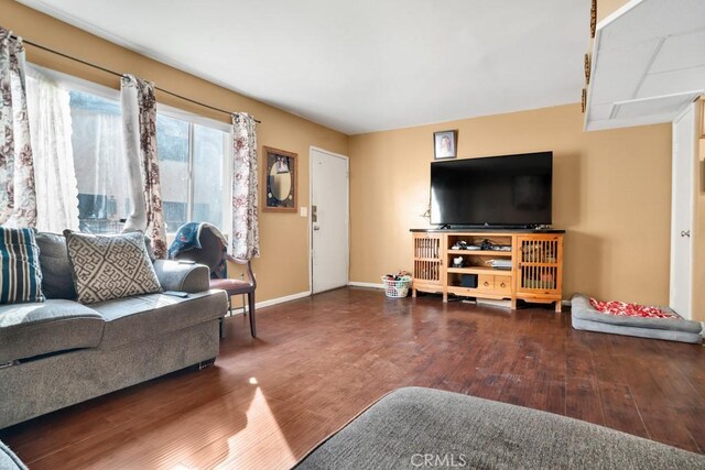 living room featuring dark hardwood / wood-style floors