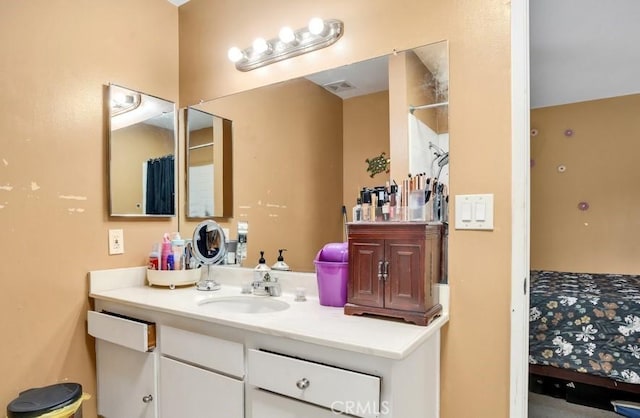 bathroom with a shower with shower curtain and vanity