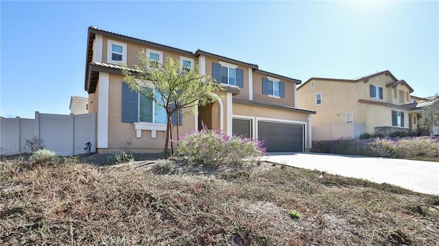 view of front of home with a garage