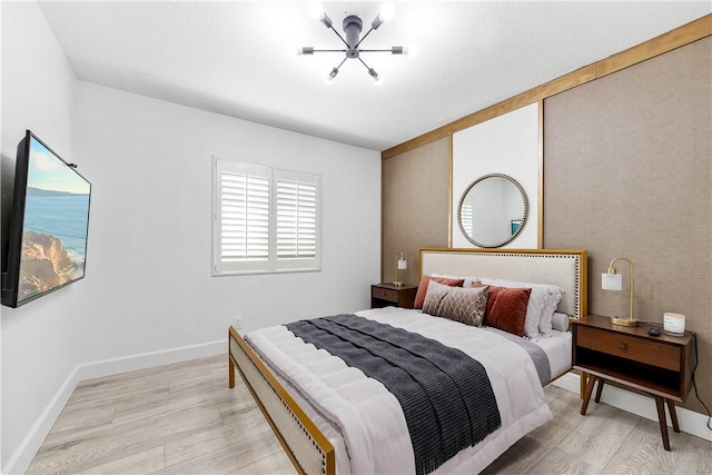 bedroom featuring light hardwood / wood-style floors