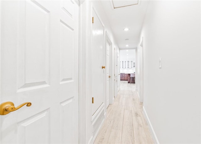 hall featuring light hardwood / wood-style floors