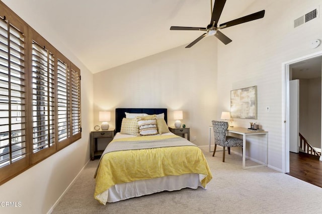 bedroom with high vaulted ceiling, ceiling fan, and carpet