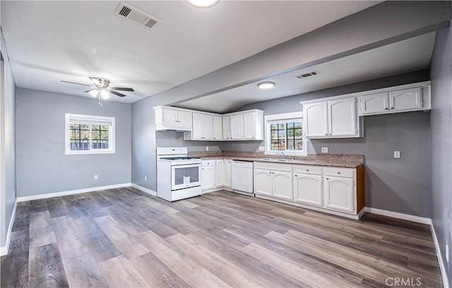 kitchen with white appliances, white cabinetry, light hardwood / wood-style floors, sink, and ceiling fan