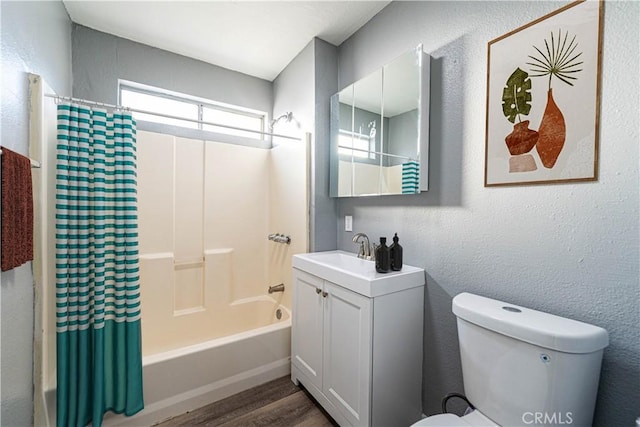 full bathroom featuring hardwood / wood-style flooring, toilet, vanity, and shower / bathtub combination with curtain