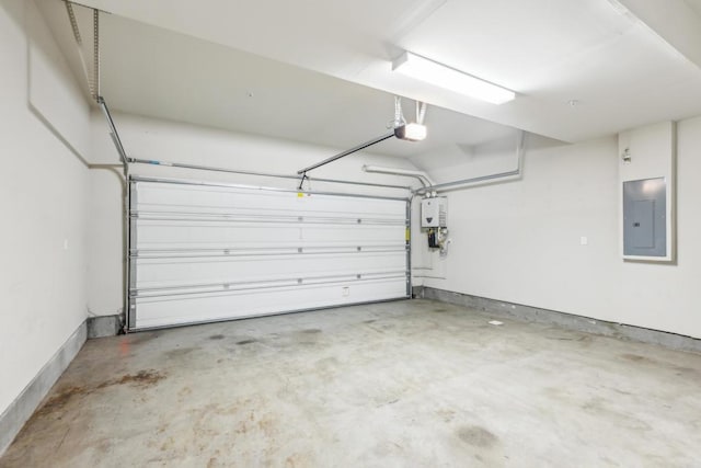 garage with tankless water heater, electric panel, and a garage door opener