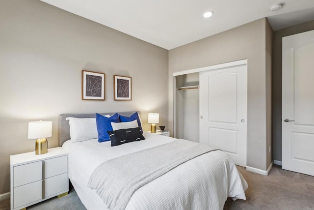 carpeted bedroom with a closet