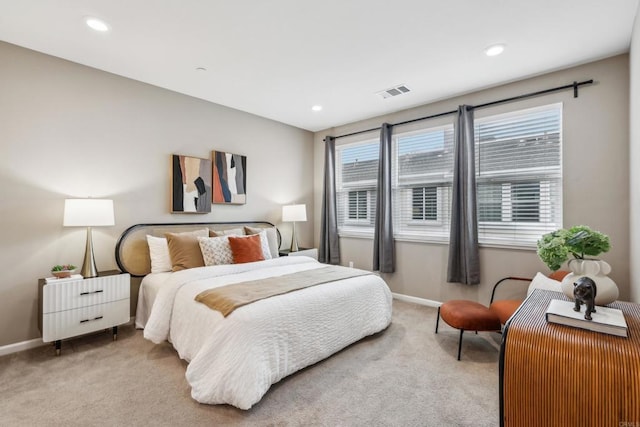 bedroom with light carpet