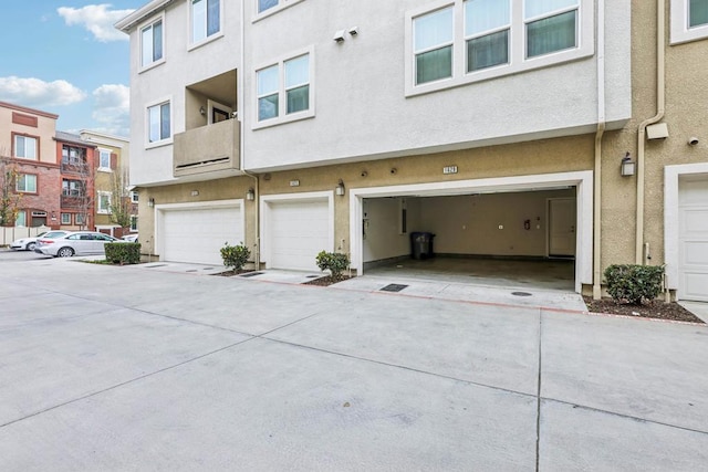 exterior space with a garage