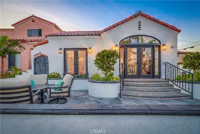 rear view of house with french doors