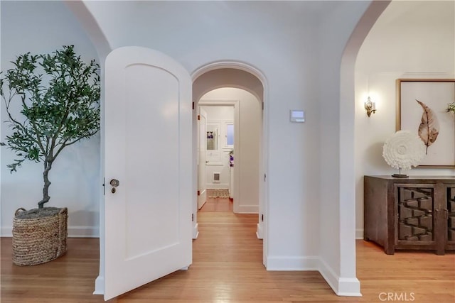 corridor featuring light hardwood / wood-style flooring