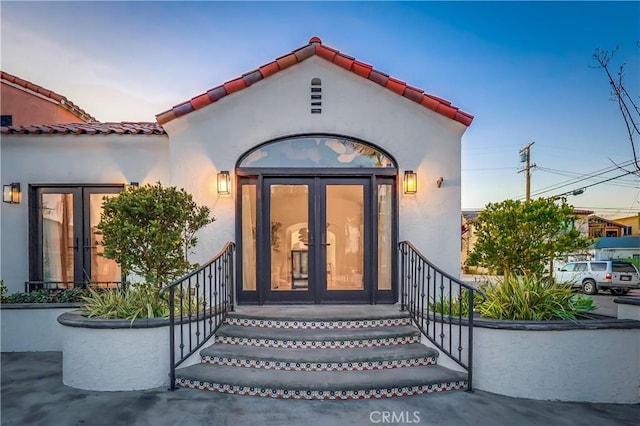 property entrance with french doors