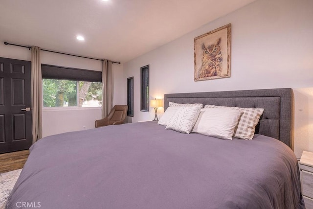 bedroom featuring wood-type flooring