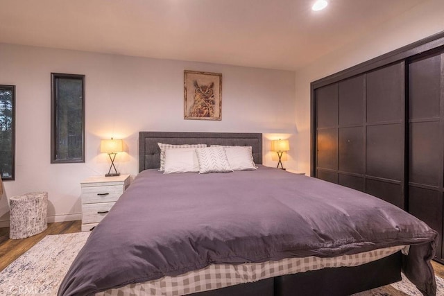 bedroom featuring light wood-type flooring