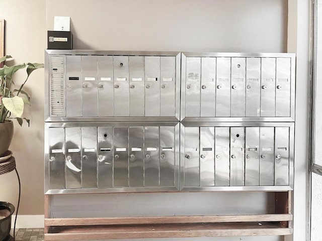 mudroom with a mail area