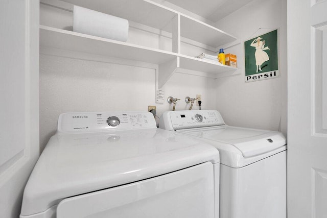 laundry area featuring washer and clothes dryer