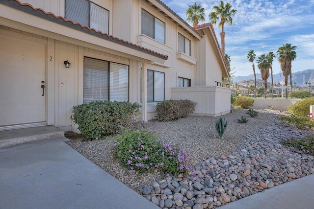 view of side of property featuring a mountain view