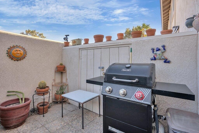 view of patio featuring grilling area