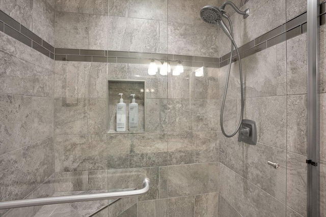 room details with a tile shower