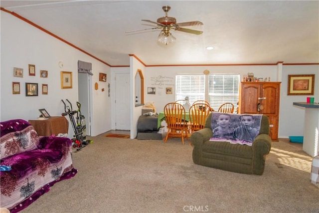 living room with ornamental molding, ceiling fan, light colored carpet, and lofted ceiling