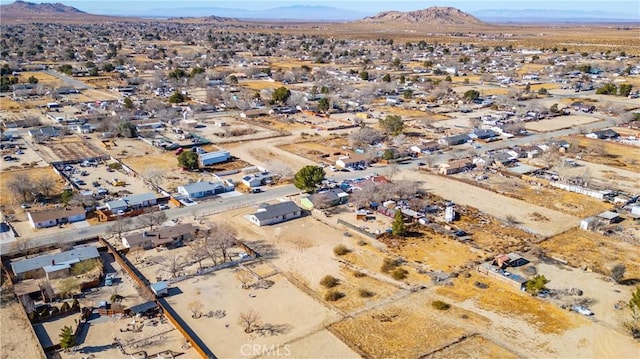 drone / aerial view featuring a mountain view