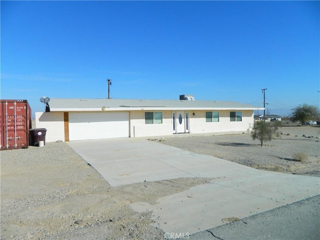 single story home with a garage