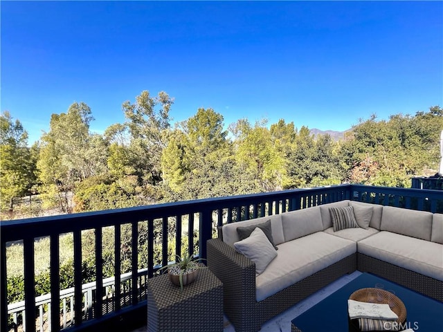 deck featuring an outdoor living space