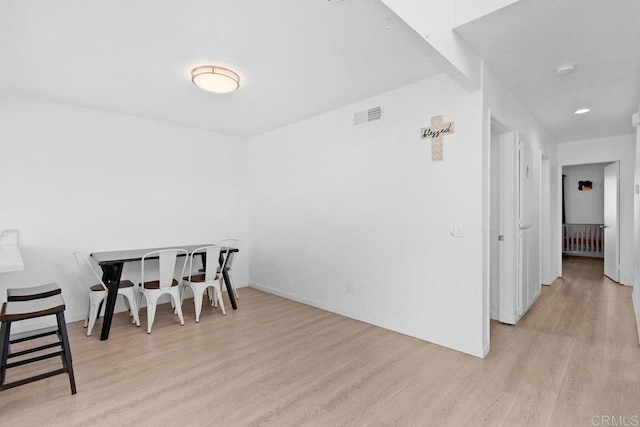 dining room featuring light wood-type flooring