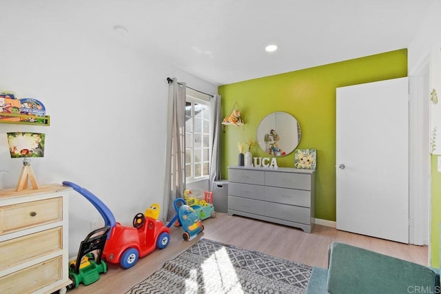 playroom featuring hardwood / wood-style floors