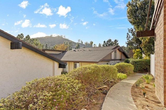 view of side of property featuring a mountain view