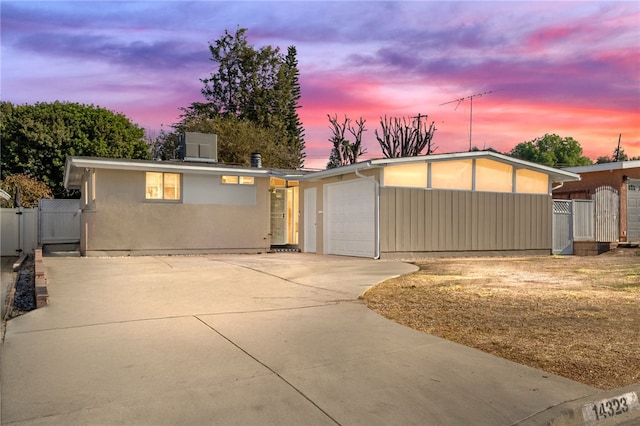 view of front of property with a garage