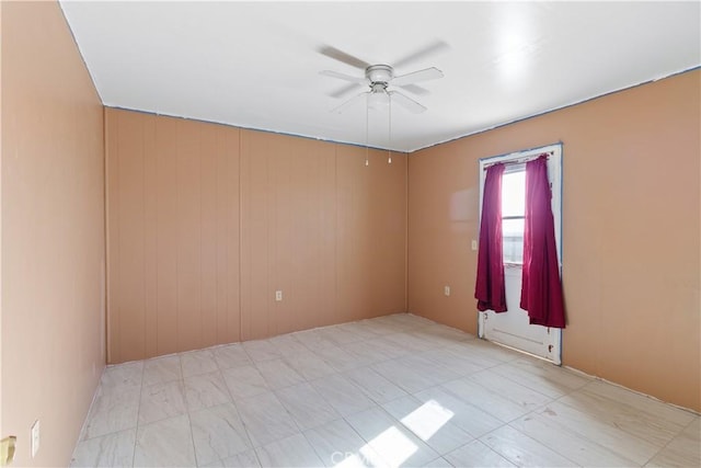 empty room with ceiling fan