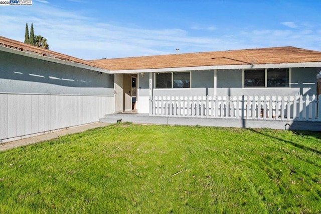 exterior space featuring a lawn