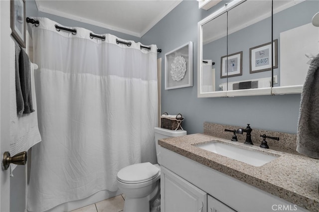 bathroom featuring vanity, toilet, crown molding, and tile patterned flooring