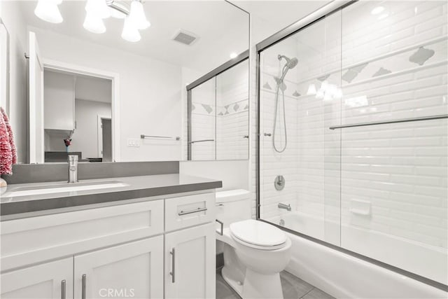 6770 Oak Ave, Arcadia, CA 91007 - bathroom with vanity, toilet, bath / shower combo with glass door, and tile patterned floors