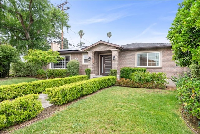 6770 Oak Ave, Arcadia, CA 91007 - ranch-style house featuring a front yard and brick siding