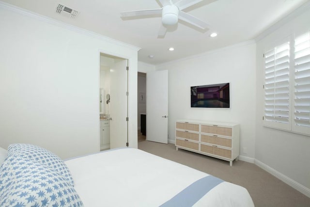 bedroom with crown molding, carpet flooring, connected bathroom, and ceiling fan