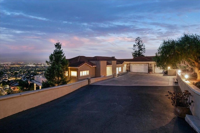 view of front of property with a garage