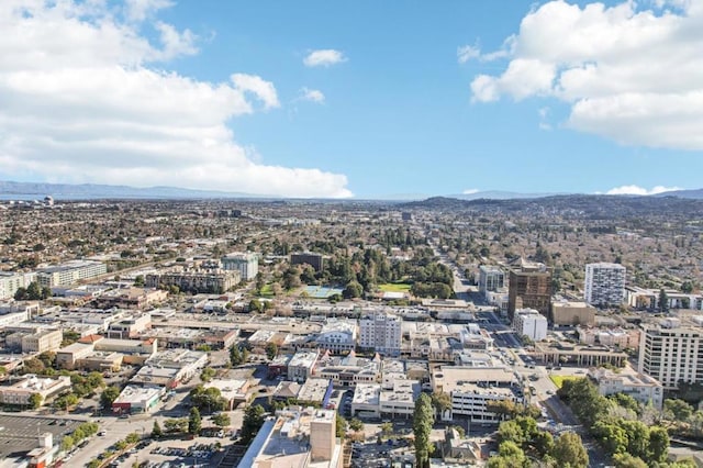 drone / aerial view featuring a mountain view