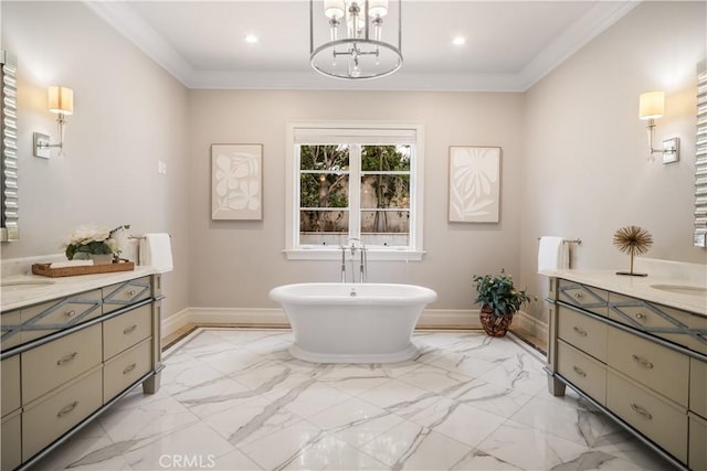 bathroom featuring a tub, a chandelier, vanity, and ornamental molding