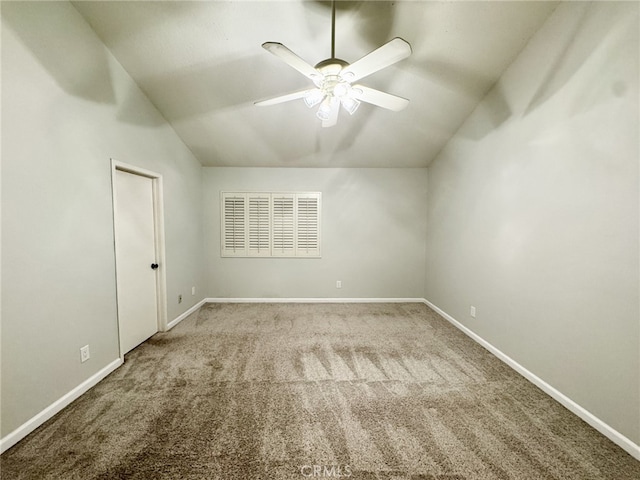 interior space with ceiling fan and lofted ceiling