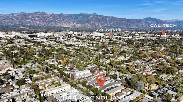 drone / aerial view featuring a mountain view