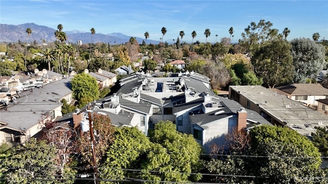 birds eye view of property featuring a mountain view