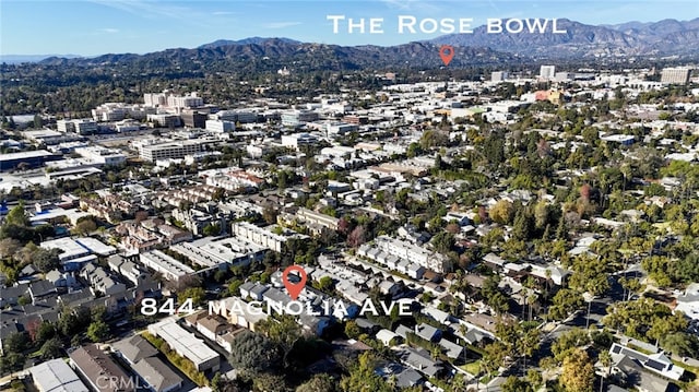 drone / aerial view featuring a mountain view