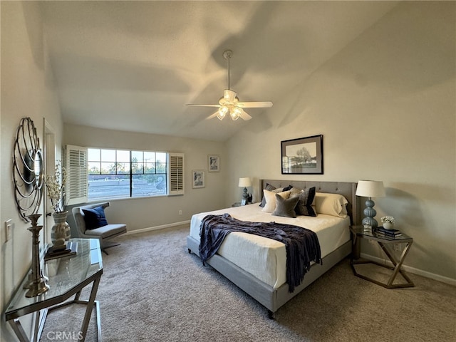 carpeted bedroom with a ceiling fan, vaulted ceiling, and baseboards